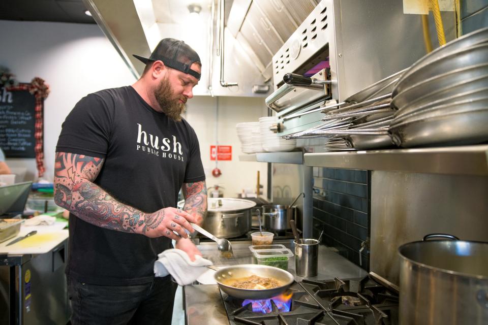 Owner and Chef Dom Ruggiero makes an Italian Beef dish at Hush Public House in Scottsdale, Ariz. on Dec. 16, 2021.