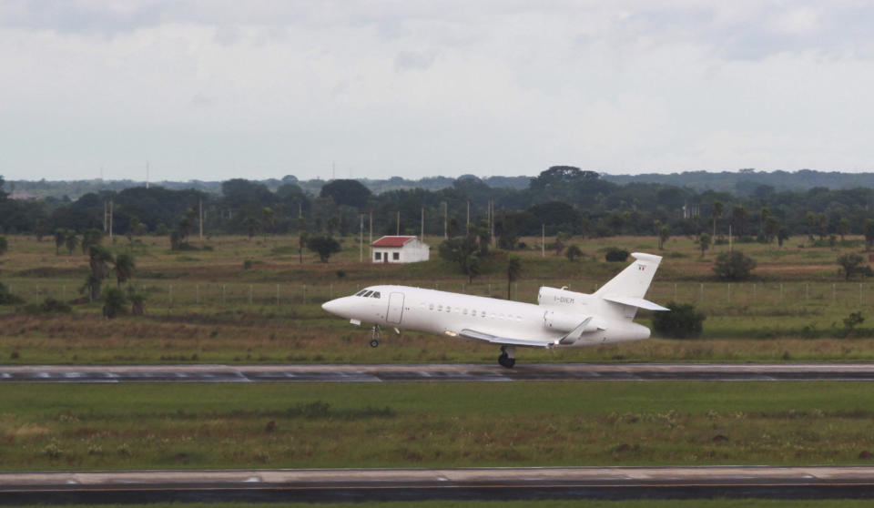 The plane carrying Italian fugitive Cesare Battisti takes off for Italy, where he will serve a life sentence, from the airport in Santa Cruz, Bolivia, Sunday, Jan. 13, 2019. Battisti escaped from an Italian prison in 1981 while awaiting trial on four counts of murder allegedly committed when he was a member of the Armed Proletarians for Communism. (AP Photo)