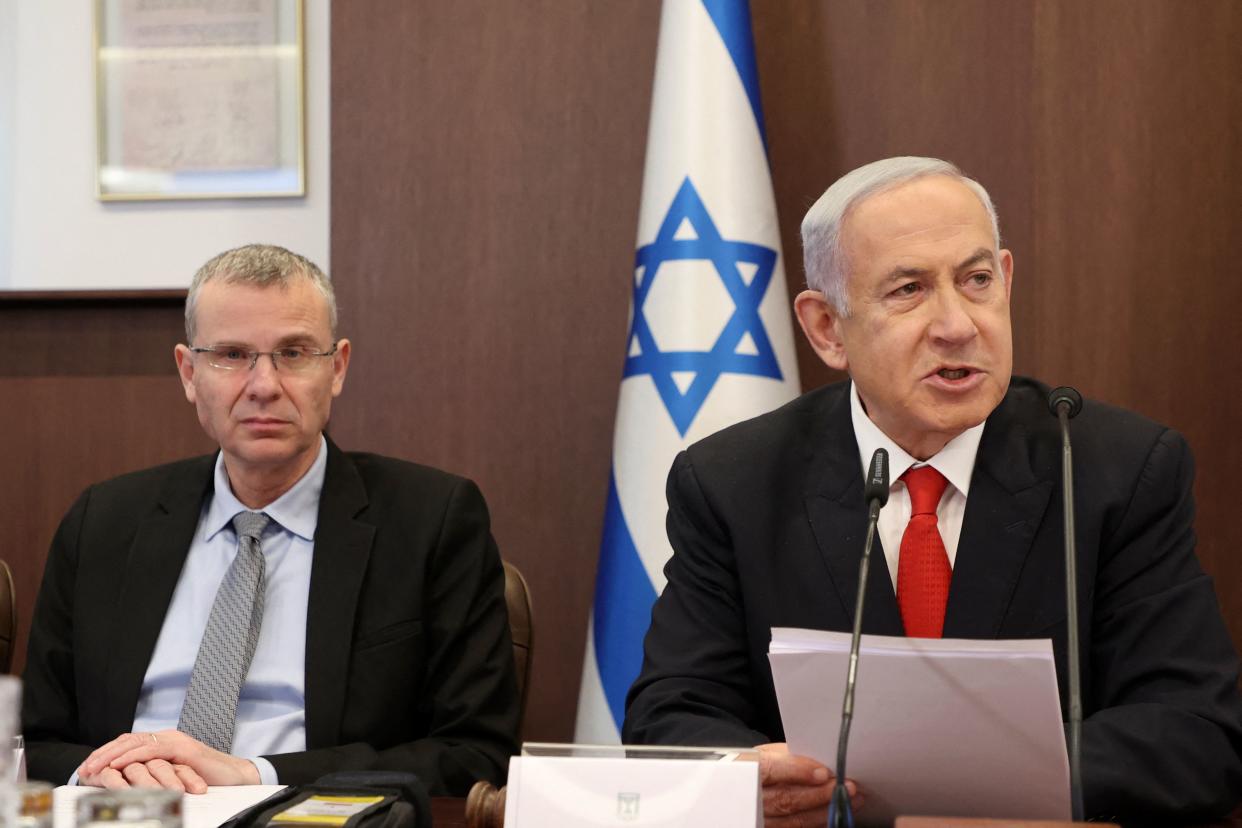Israeli Prime Minister Benjamin Netanyahu at a Cabinet meeting with Justice Minister Yariv Levin.