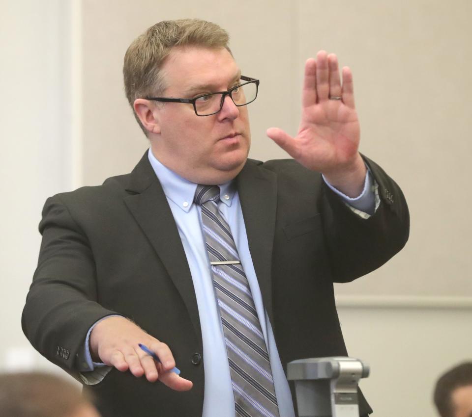 Assistant Summit County Prosecutor Brian Stano gestures Monday during the first day of testimony in Eric Pursley's murder trial. Pursley is accused in the October 2022 shooting death of his landlord, Daniel Stein. Pursley is claiming self-defense.