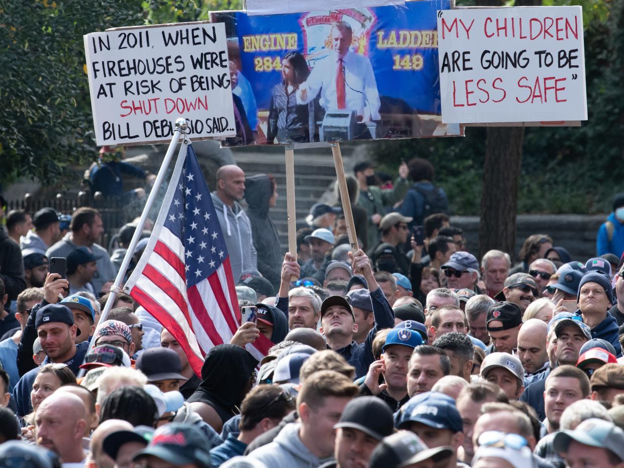 FDNY firefighters and other protestors gather outside Gracie Mansion in Manhattan, New York on Oct. 28, 2021 to protest the city's coronavirus vaccine mandates.