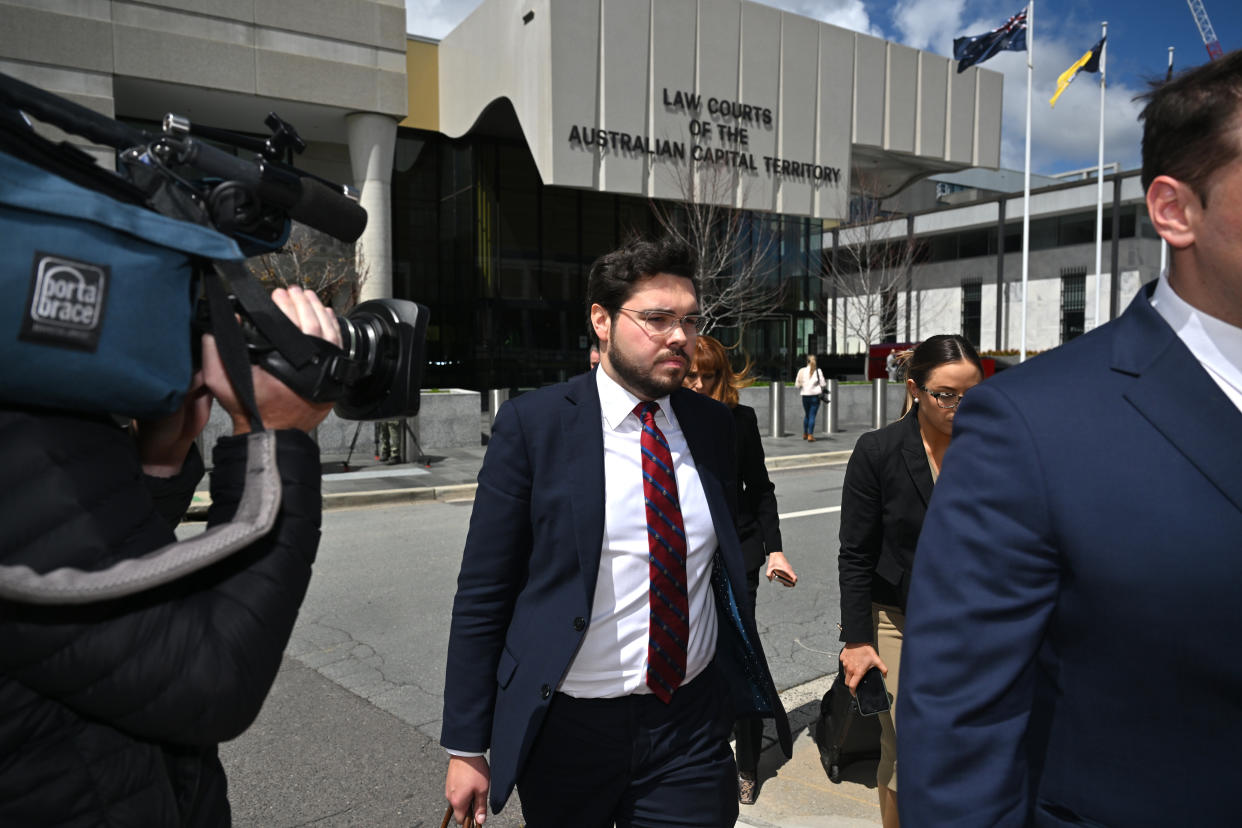 Former Liberal Party staffer Bruce Lehrmann leaves the ACT Supreme Court in Canberra, Friday, October 14, 2022. Former Liberal Party staffer Bruce Lehrmann is accused of raping a colleague Brittany Higgins at Parliament House in 2019. (AAP Image/Mick Tsikas) NO ARCHIVING
