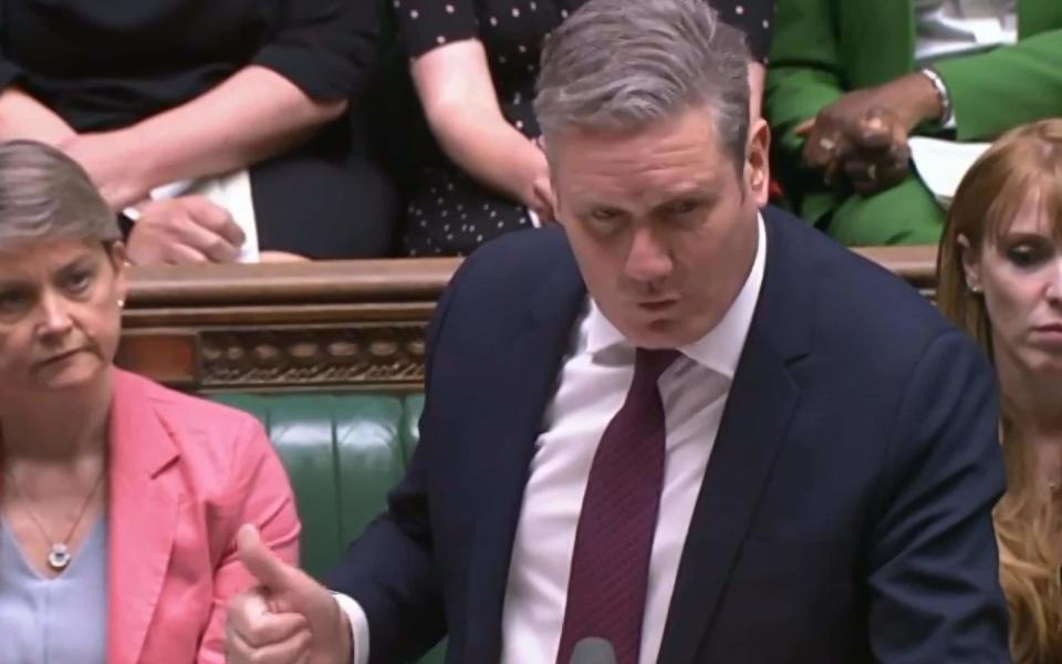 Sir Keir Starmer, the Labour leader, addresses the House of Commons during PMQs today - PA