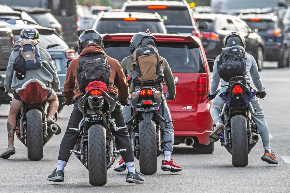 Bumper-to-bumper motorcycles and cars travel along Rehoboth Avenue on Memorial Day weekend in Rehoboth Beach on Saturday, May 27, 2023.