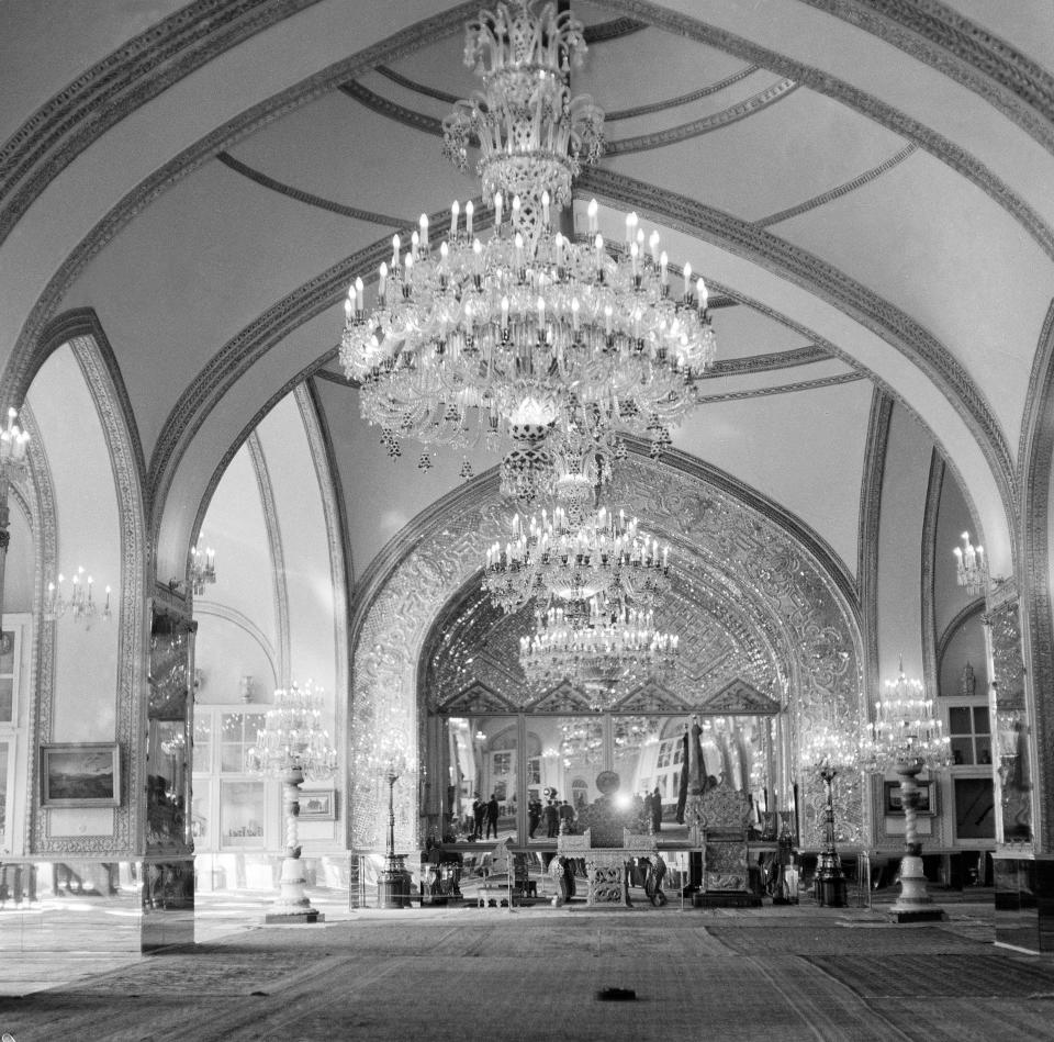 This Oct. 27, 1960 file photo, shows a partial view of the Throne Hall of the Royal Golestan Palace, in Tehran, Iran. Iran's ancient and rich cultural landscape has become a potential U.S. military target as Washington and Tehran lob threats and take high-stakes steps toward a possible open conflict. President Donald Trump tweeted Saturday, Jan. 4, 2020, that if Iran targets any American assets to avenge the killing of a top Iranian general, the U.S. has 52 Iranian sites it will hit, including ones “important to Iran & Iranian culture." (AP Photo/Jim Pringle, File)