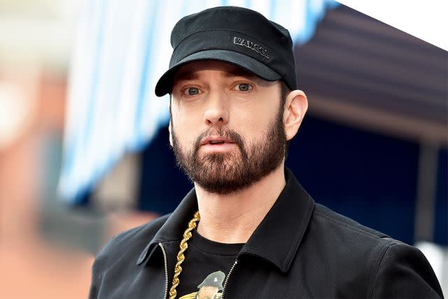 <p>Axelle/Bauer-Griffin/FilmMagic</p> Eminem attends the ceremony honoring 50 Cent with a star on the Hollywood Walk of Fame on Jan. 30, 2020