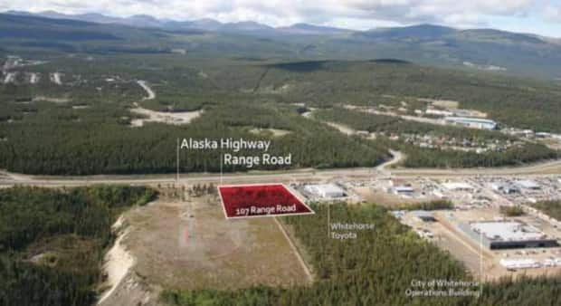 The lot is just off the Alaska Highway, adjacent to the airport.