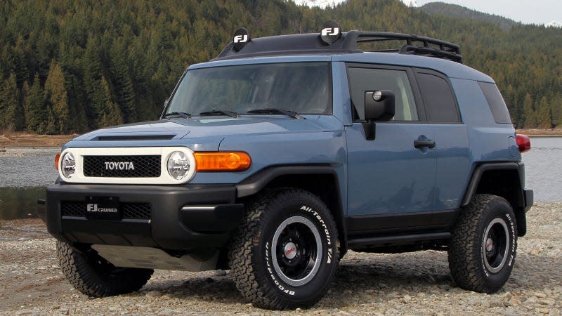 A photo of a blue Toyota FJ Cruiser SUV. 