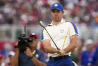 Team Europe's Rory McIlroy watches his shot on the 15th hole during a Ryder Cup singles match at the Whistling Straits Golf Course Sunday, Sept. 26, 2021, in Sheboygan, Wis. (AP Photo/Charlie Neibergall)