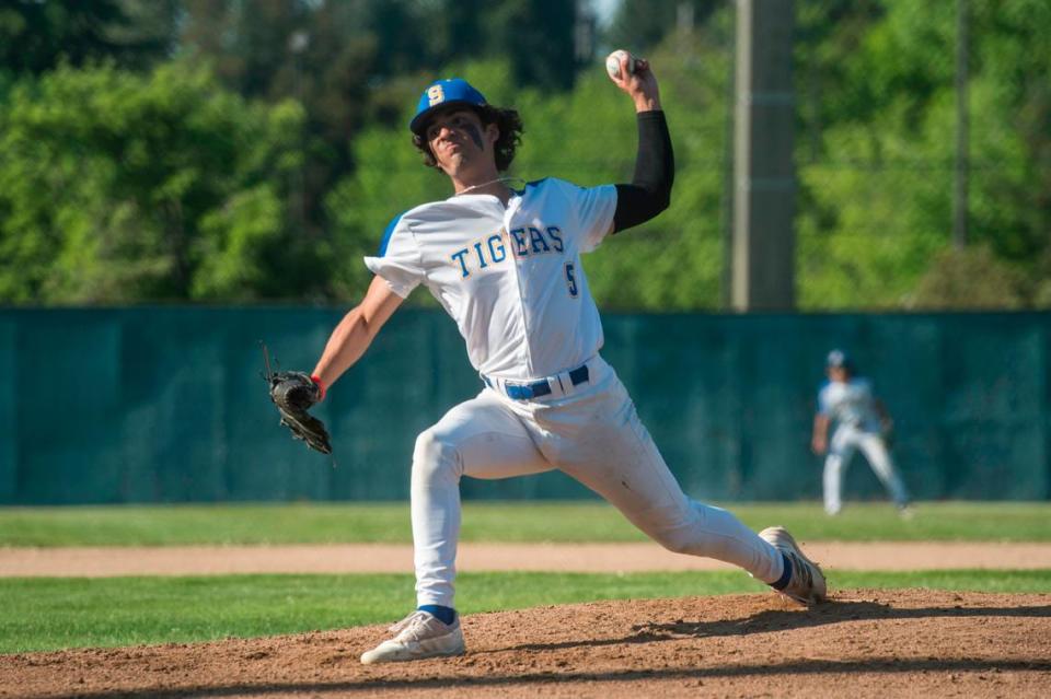 Stadium starter Marcel Mercado (5) throws a pitch in a game against Gig Harbor in the opening round of the Class 3A state baseball playoffs on Tuesday, May 16, 2023 at Heidelberg Sports Complex in Tacoma, Wash.
