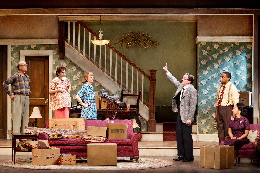 In this theater image released by O+M Co., from left, Frank Wood, Annie Parisse, Christina Kirk, Jeremy Shamos, Damon Gupton, and Crystal A. Dickinson are shown in a scene from "Clybourne Park," at the Walter Kerr Theatre, in New York. (AP Photo/The O+M Co., Nathan Johnson Photography)