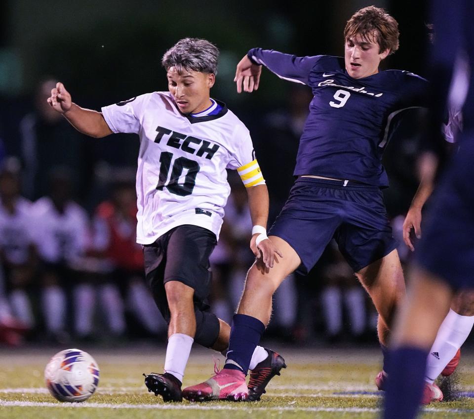 Indianapolis Arsenal Technical midfielder Edwin Molina (10) rushes after the ball against Cathedral Fighting Irish Calvin Kurzawa (9) on Wednesday, Sept. 28, 2022, at Bishop Chatard High School in Indianapolis.  
