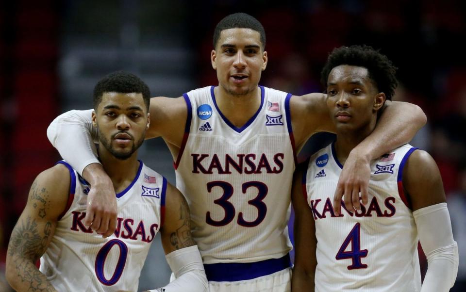 Projected Kansas starters Frank Mason, Landen Lucas and Devonte Graham (Getty Images)