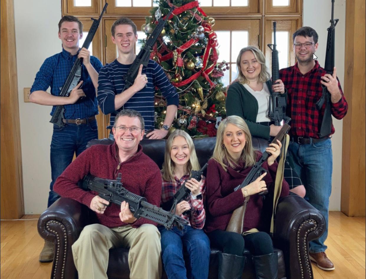 Kentucky congressman Thomas Massie and his family posted their Christmas card on Twitter. In that photo, all seven family members are brandishing high powered weapons, including the family patriarch, who is grinning while holding an M-60 machine gun The photo was put online days after a Michigan gunman fatally shot four students at Oxford Township school, using a “Christmas present” from his parents.