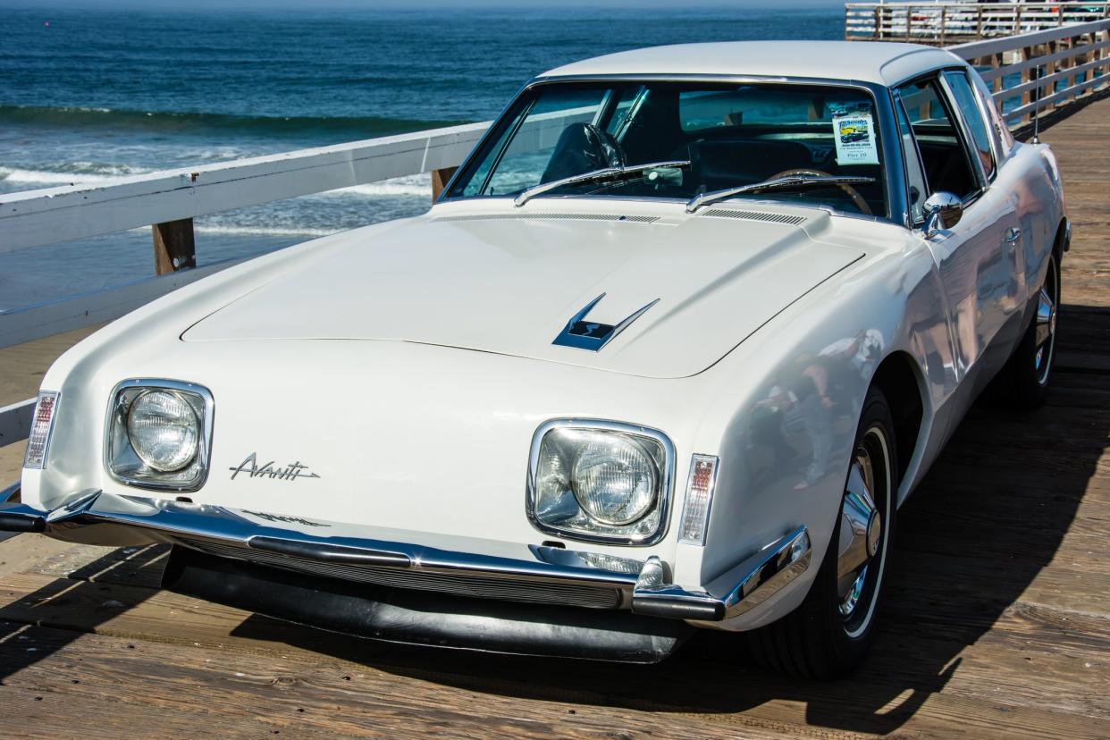 Pismo Beach, California, United States - June 21, 2014: White 1964 Studebaker Avanti on the pier at Pismo Beach