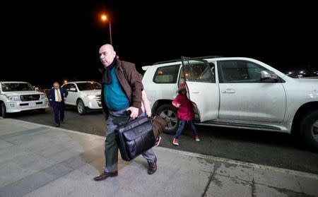 Fuad Sharef, an Iraqi with an immigration visa who was prevented with his family from boarding a flight to New York a week ago, carries his bag at Erbil International Airport, Iraq February 4, 2017, to fly, on Turkish Airlines, to Nashville, Tennessee, their new home. REUTERS/Ahmed Saad