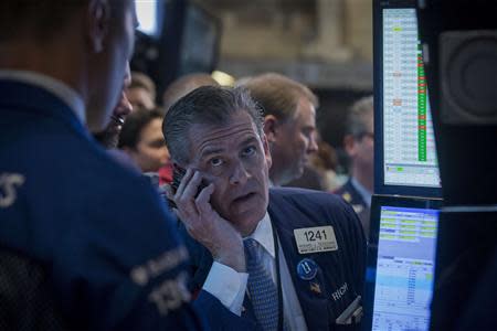 Traders work on the floor of the New York Stock Exchange May 2, 2014. REUTERS/Brendan McDermid