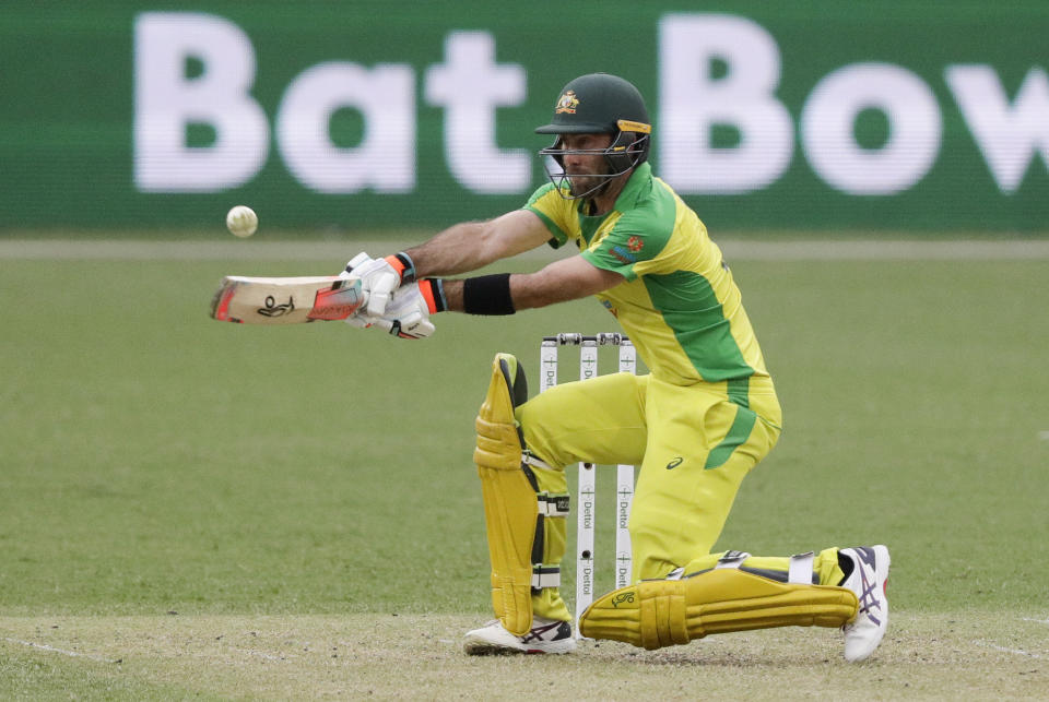 Australia's Glenn Maxwell bats during the one day international cricket match between India and Australia at the Sydney Cricket Ground in Sydney, Australia, Sunday, Nov. 29, 2020. (AP Photo/Rick Rycroft)