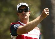 Sweden's Henrik Stenson checks the breeze on the fourth hole during the third round of the Masters golf tournament at the Augusta National Golf Club in Augusta, Georgia April 12, 2014. REUTERS/Jim Young (UNITED STATES - Tags: SPORT GOLF)