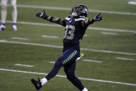 Seattle Seahawks strong safety Jamal Adams (33) reacts to a play against the Los Angeles Rams during the second half of an NFL football game, Sunday, Dec. 27, 2020, in Seattle. The Seahawks won 20-9. (AP Photo/Elaine Thompson)