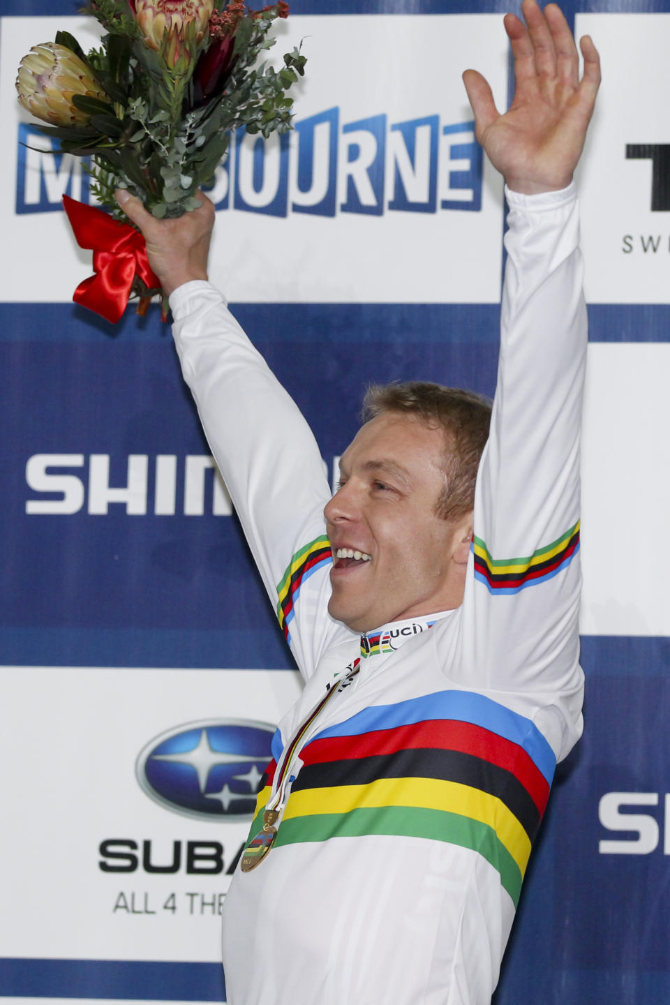 Sir Chris Hoy reacts on the podium for the Keirin at the 2012 Track Cycling World Championships in Melbourne, on April 8, 2012.  IMAGE STRICTLY RESTRICTED TO EDITORIAL USE - STRICTLY NO COMMERCIAL USE        AFP PHOTO/Mark GUNTER (Photo credit should read Mark Gunter/AFP/Getty Images)