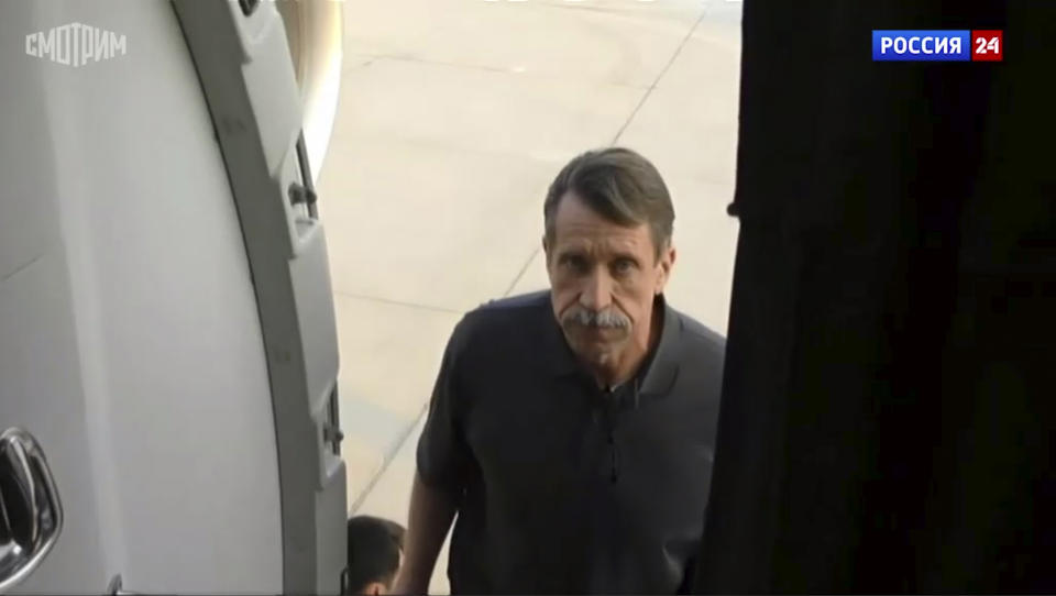 FILE - In this image taken from video provided by RU-24 Russian Television on Friday, Dec. 9, 2022, Russian citizen Viktor Bout, who was exchanged for U.S. basketball player Brittney Griner, boards a Russian plane in Abu Dhabi, United Arab Emirates, after the swap. Arrests of Americans in Russia have become increasingly common as relations between Moscow and Washington sink to Cold War lows. Some have been exchanged for Russians held in the U.S., while for others, the prospects of being released in a swap are less clear. (RU-24 Russian Television via AP, File)