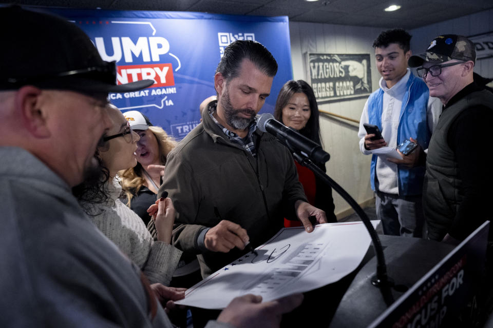 Donald Trump, Jr. greets members of the audience after speaking at the Machine Shed in Urbandale, Iowa, Thursday, Jan. 11, 2024. (AP Photo/Andrew Harnik)