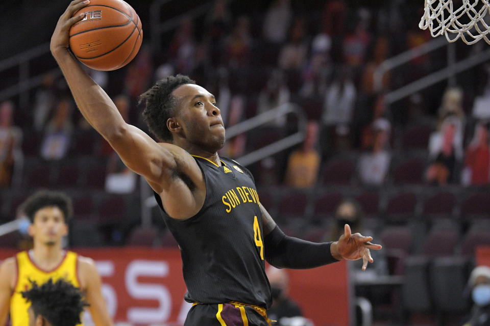 Arizona State forward Kimani Lawrence goes up for a dunk during the first half of the team's NCAA college basketball game against Southern California on Wednesday, Feb. 17, 2021, in Los Angeles. (AP Photo/Mark J. Terrill)