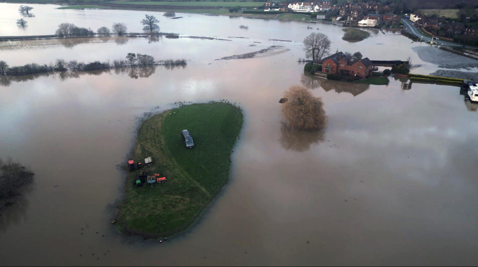 WORCESTERSHIRE, UNITED KINGDOM - JANUARY 05: An aerial view of flooded area as homes and streets deluged by water in aftermath of heavy rain in Worcestershire, United Kingdom on January 05, 2024. UK is grappling with a severe flooding following heavy rainfall. The extensive deluge, leaves homes and streets submerged in water. Authorities are working on response measures. (Photo by Yunus Dalgic/Anadolu via Getty Images)