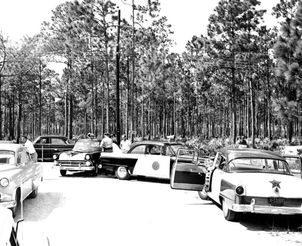Miami-Dade police cars assemble near Coral Reef Drive in the 1960s.