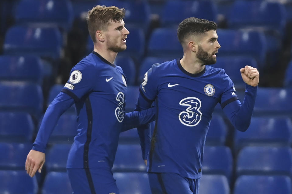 Chelsea's Christian Pulisic, right, celebrates with Timo Werner after scoring their side's third goal during the English Premier League soccer match between between Chelsea and Leeds United at Stamford Bridge in London, England, Saturday, Dec. 5, 2020. (Mike Hewitt, Pool via AP)