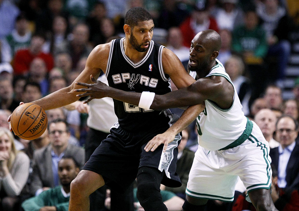 Tim Duncan and Kevin Garnett were rivals for 19 seasons. (Yoon S. Byun/The Boston Globe via Getty Images)