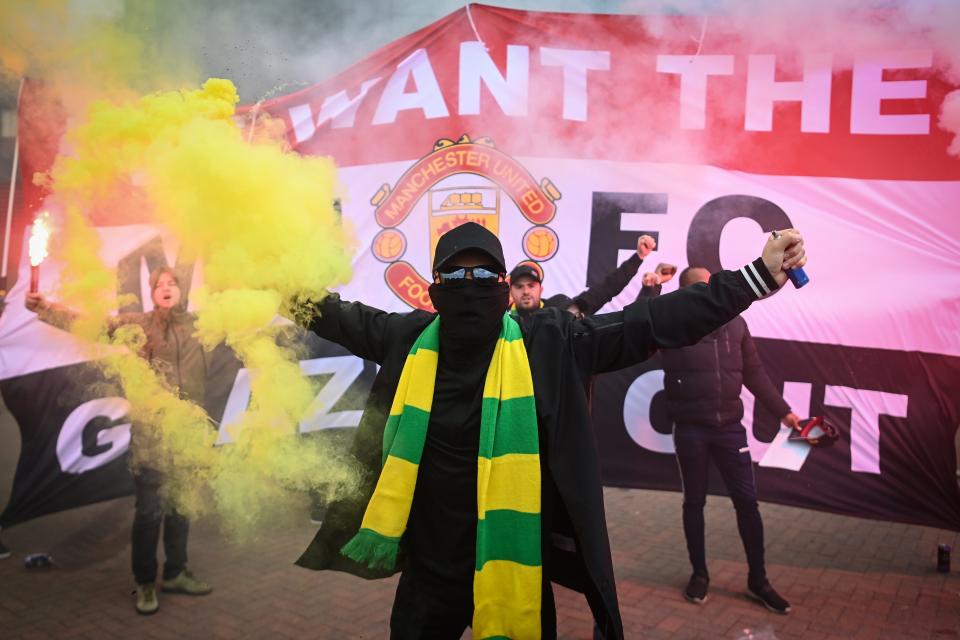 Fans are seen protesting Manchester United’s Glazer ownership outside Old Trafford (Getty)