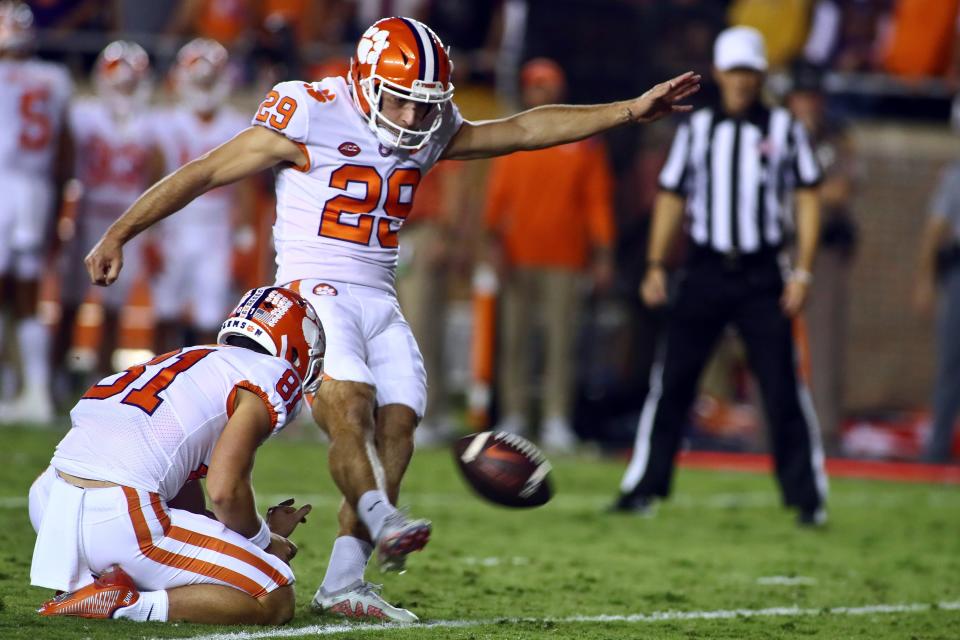 Clemson's B.T. Potter (29) kicks an extra point during the second quarter of the team's NCAA college football game against Florida State on Saturday, Oct. 15, 2022, in Tallahassee, Fla. (AP Photo/Phil Sears)