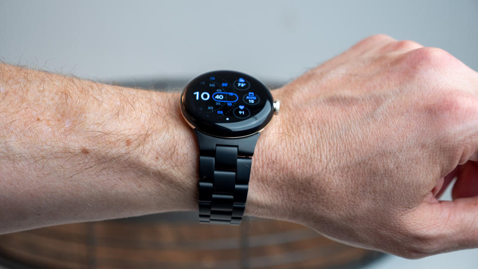 The Google Pixel Watch with the official metal band in matte black