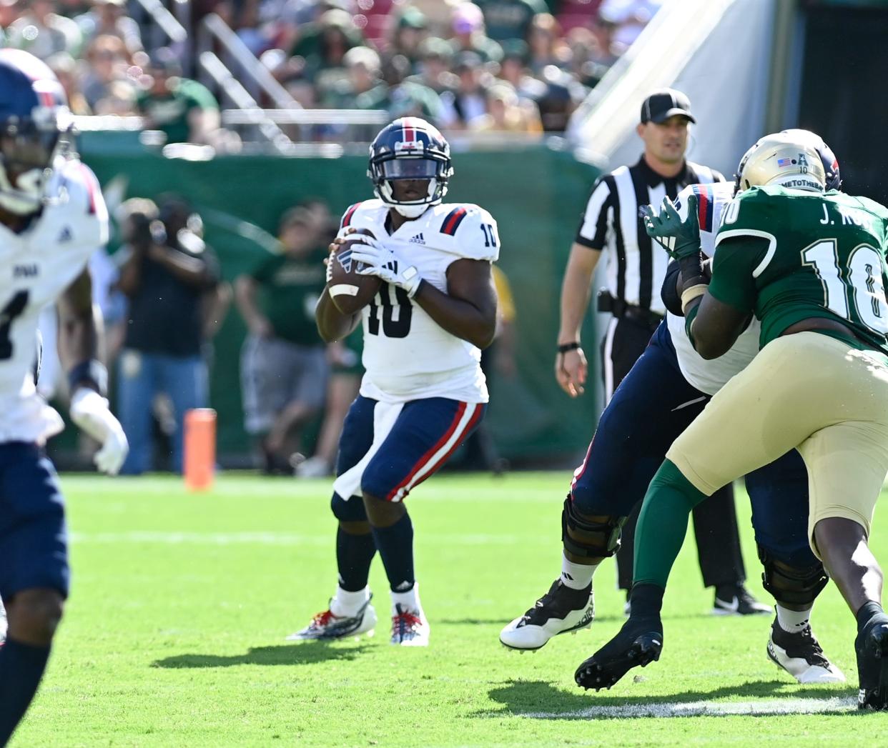 FAU quarterback Daniel Richardson completed 31 of 38 passes for a career-high 382 yards and three touchdowns in Saturday's win over USF.