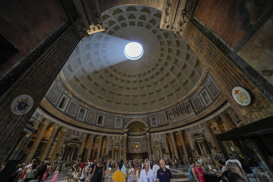 Visitors tour the interior of the Pantheon's dome in Rome, on Thursday, Aug. 24, 2023. (AP Photo/Andrew Medichini)