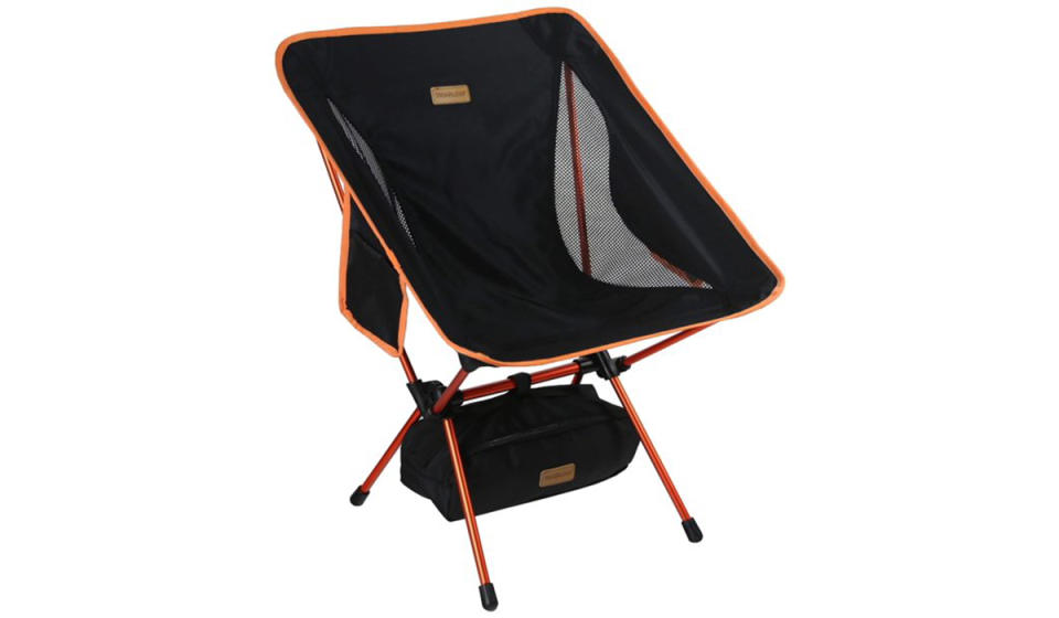 Black portable camp chair with orange base. 