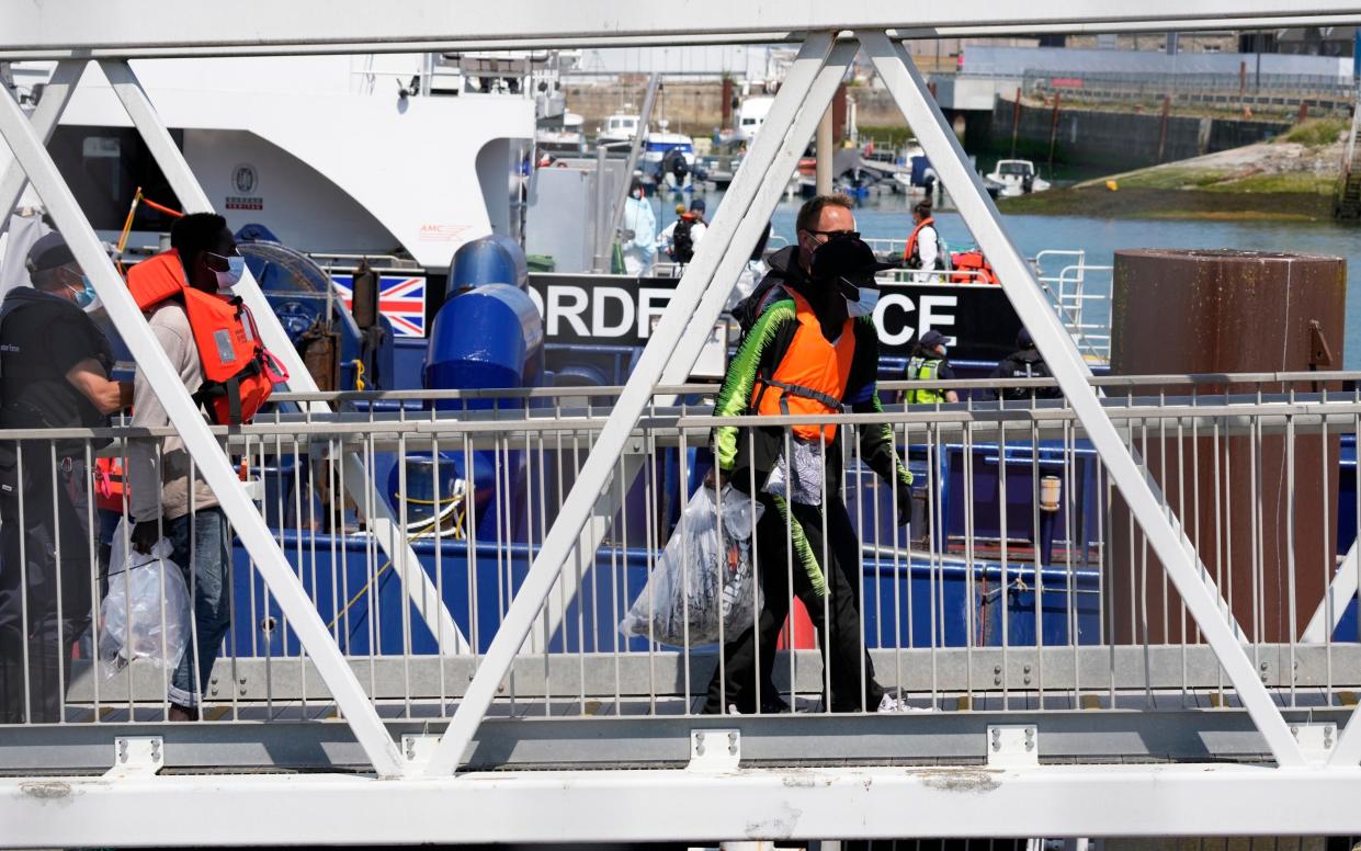 At least another 100 migrants are believed to have reached the UK across the channel on Thursday - Matt Dunham/AP