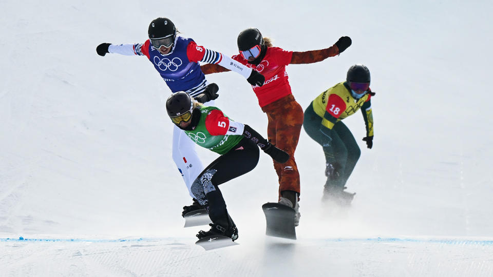 Australia's Belle Brockhoff, right, finished fourth in the women's snowboard cross final at the Beijing Winter Olympics. (Photo by An Lingjun/CHINASPORTS/VCG via Getty Images)