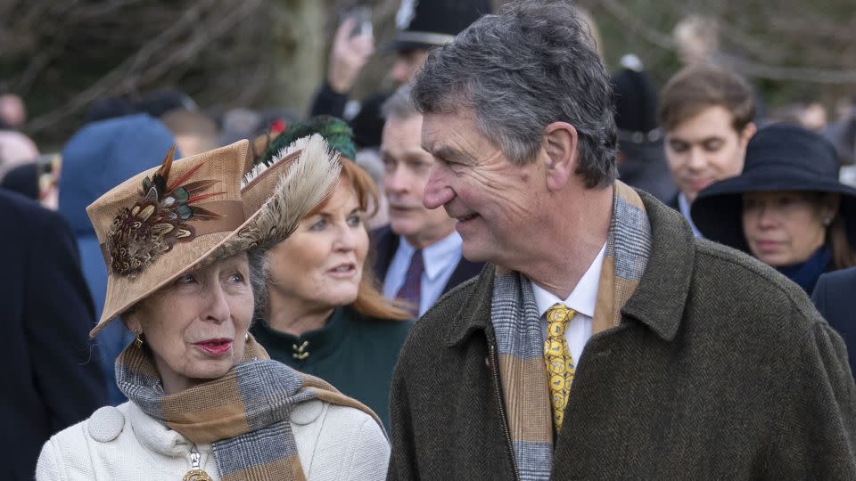 Princess Anne and Timothy Laurence attend the Christmas Day service at St Mary Magdalene Church in the matching "Heritage Highgrove Scarf." - Mark Cuthbert/UK Press via Getty Images