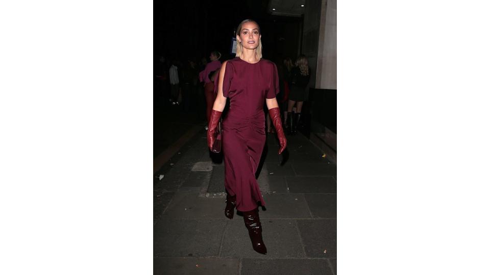 Frankie Bridge wearing a burgundy dress