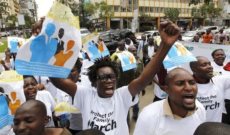 Members of the anti-gay caucus chant slogans against the lesbian, gay, bisexual, and transgender (LGBT) community as they march along the streets in Kenya's capital Nairobi July 6, 2015. REUTERS/Thomas Mukoya