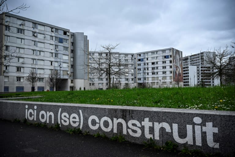 The Francs-Moisins estate near the Stade de France where a sign says: 'Here we build (ourselves)' (JULIEN DE ROSA)