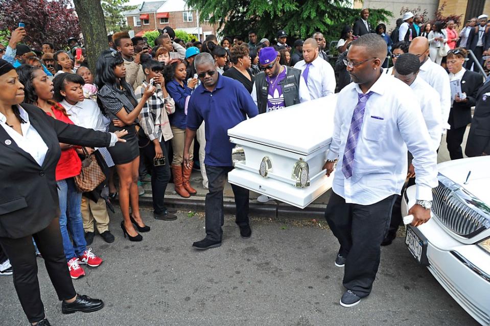 The casket containing D’Aja Robinson is carried out of the Greater Allen A.M.E. Cathedral by friends and family after funeral services conclude for the young girl who was shot in the head while on a MTA city bus. Matthew McDermott