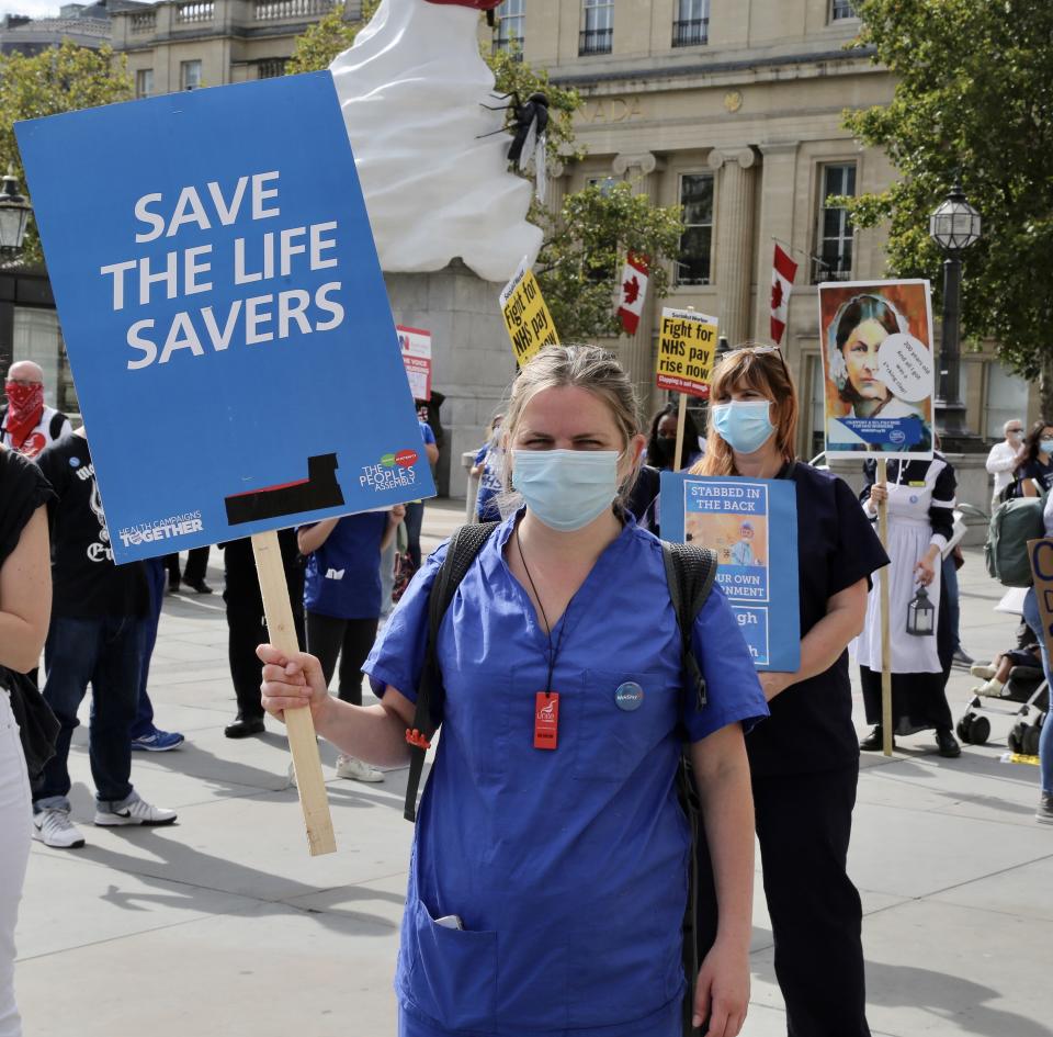 LONDON, UNITED KINGDOM- SEPTEMBER 12: NHS workers attend the 'March for Pay' Demonstration in London, United Kingdom on September 12, 2020. (Photo by Hasan Esen/Anadolu Agency via Getty Images)