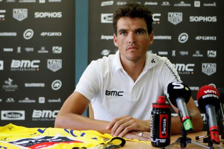 Cycling - Tour de France - Rest day - Aix-les-Bains, France, July 16, 2018. BMC Racing Team rider Greg Van Avermaet of Belgium looks at his yellow jersey during the press conference. REUTERS/Emmanuel Foudrot