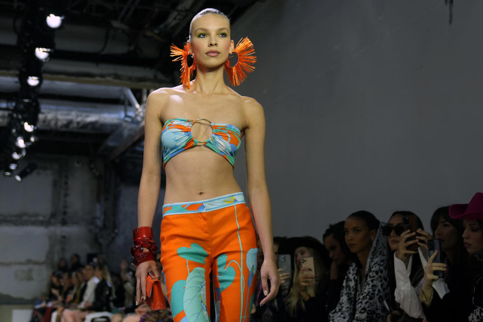 A model wears a creation for the Leonard ready-to-wear Spring/Summer 2023 fashion collection presented Friday, Sept. 30, 2022 in Paris. (AP Photo/Francois Mori)