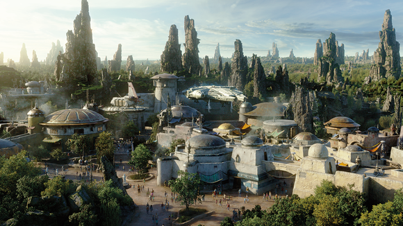 An overhead view of a Star Wars-themed area depicting a small town set in an other-worldly place with strange rock formations in the background.
