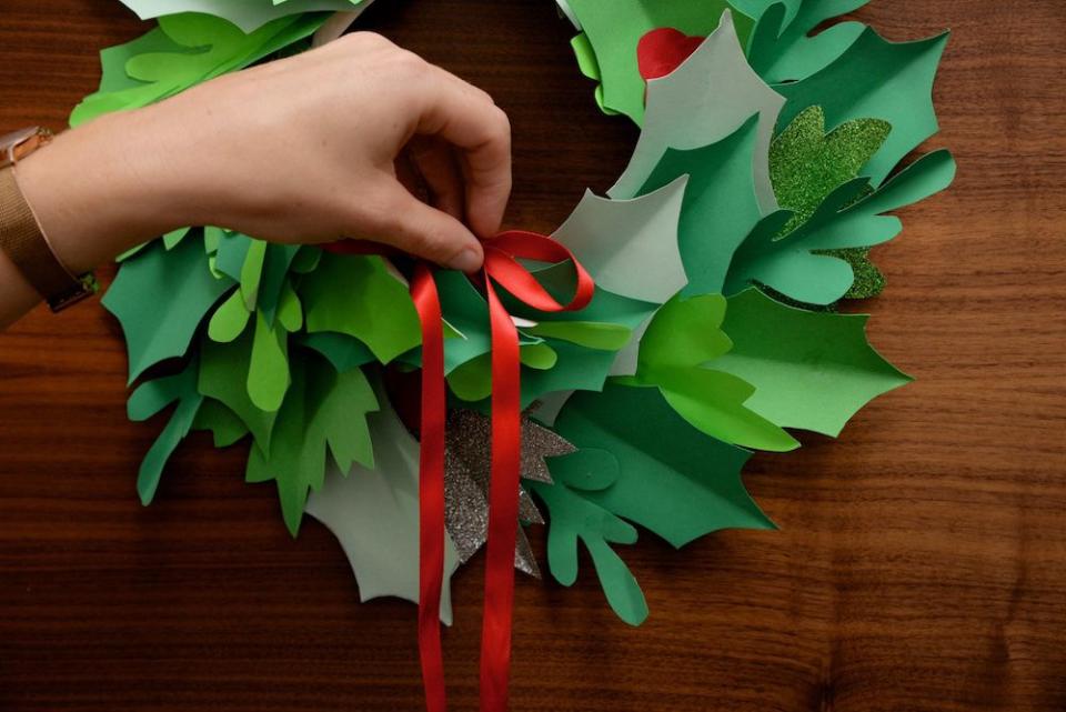 <p>For my final craft, we are heading back to Mind’s crafty templates for a <a rel="nofollow noopener" href="https://www.mind.org.uk/media/24133697/paper-wreath-template.pdf?ctaId=/get-involved/donate-or-fundraise/do-your-own-fundraising/crafternoon/crafty-templates/slices/paper-wreath/" target="_blank" data-ylk="slk:paper Christmas wreath;elm:context_link;itc:0;sec:content-canvas" class="link ">paper Christmas wreath</a>. </p><p>All you need is green and red paper or card, a paper plate, scissors, ribbon, glue and a pencil. However, if you’re dead set on nature’s wreath, check out all the inspirational posts on <a rel="nofollow noopener" href="https://www.pinterest.co.uk/house_beautiful/" target="_blank" data-ylk="slk:Pinterest;elm:context_link;itc:0;sec:content-canvas" class="link ">Pinterest</a> for tips on what to collect and how to craft it all together.</p>